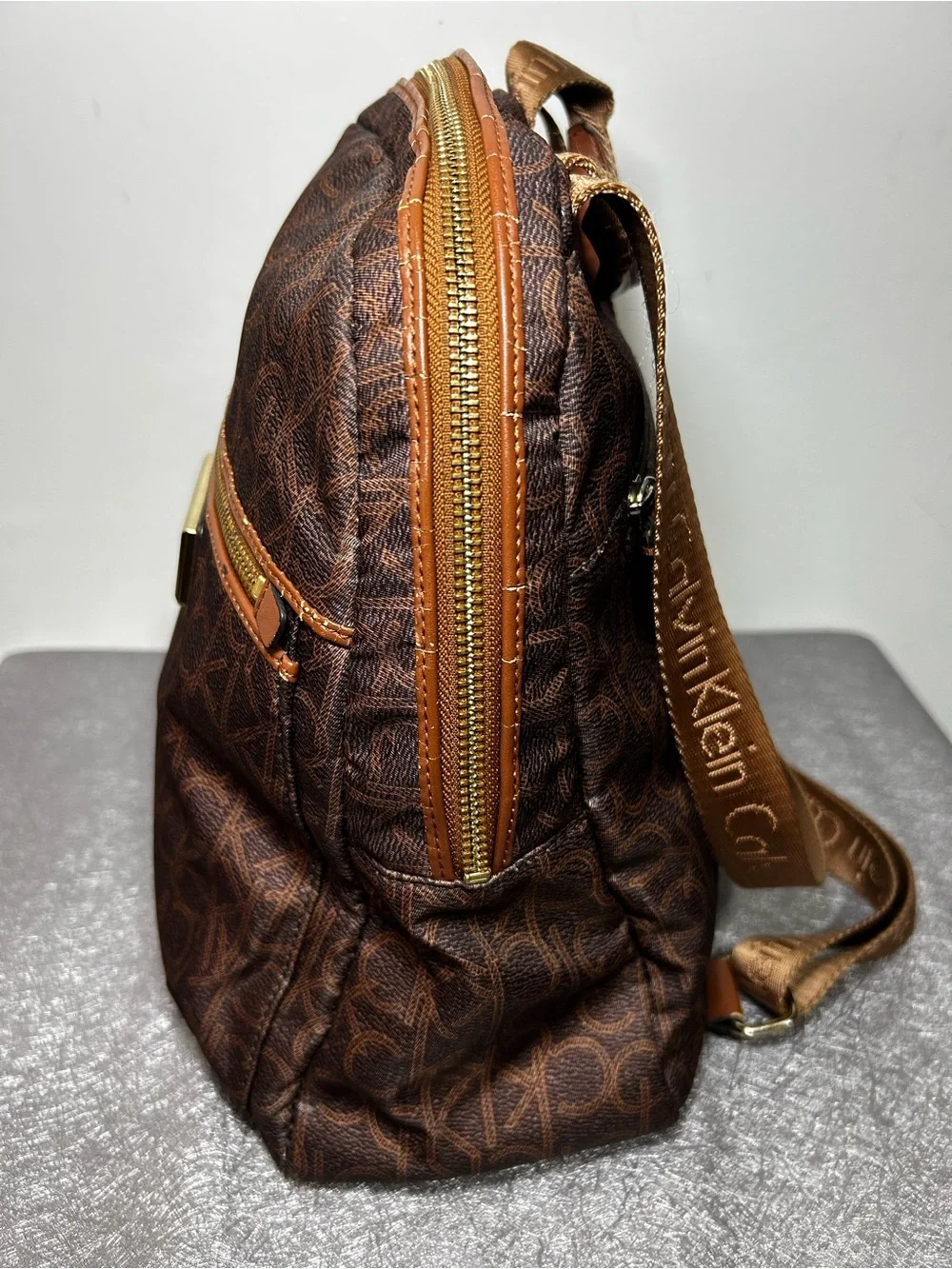 Calvin Klein Brown Logo Print Backpack Zip Front Pocket Gold Hardware